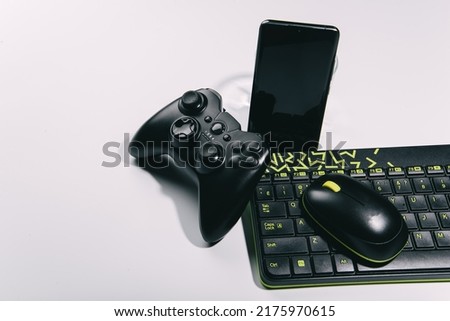 Gamepad, keyboard and phone. Gaming platforms