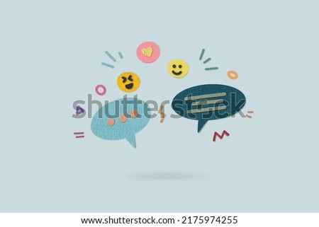 Chat and emoji icon abstract social media and technology such as love, like, comment icon paper cut art texture style background.