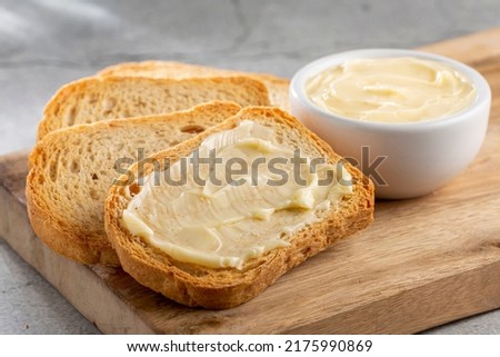 Healthy wholemeal toast with butter. Royalty-Free Stock Photo #2175990869