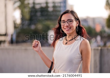 Portrait of a businesswoman on the street of a city. Royalty-Free Stock Photo #2176004491