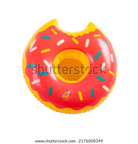 Top view closeup isolated studio shot of colorful icing glazed bitten red and yellow donut round shape swimming pool lifesaving kid rubber ring using on sea beach vacation placed on white background.
