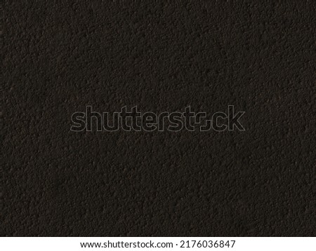 Seamless black concrete wall image ready for texture pattern.