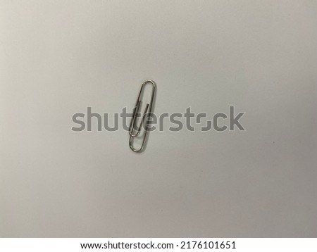 paper plug  Placed on a flat white paper surface.  used for background images and abstract illustrations.