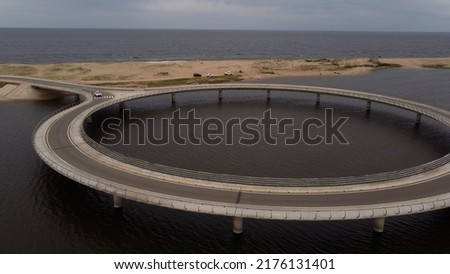 Empty circular bridge at Laguna Garzon, Uruguay. Aerial view