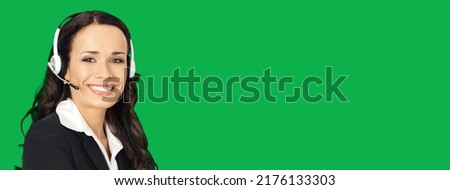 Call center service. Portrait of customer support phone sales operator in headset, isolated on vivid green background with copy space area for text, imaginary or slogan.  Skype zoom chat