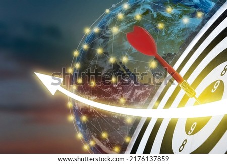 Darts hitting target on board, illustration of graph, Earth planet and view sky at sunset