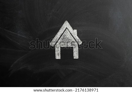 Image of drawn pictures on chalk board background. Chalk board drawing.