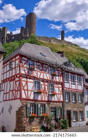 Historical buildings and castle in the old centre of Monreal Royalty-Free Stock Photo #2176175665