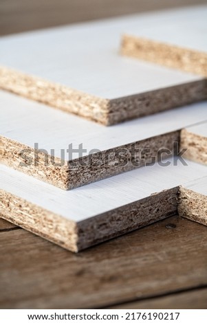 White melamine stack in kitchen furniture factory Royalty-Free Stock Photo #2176190217