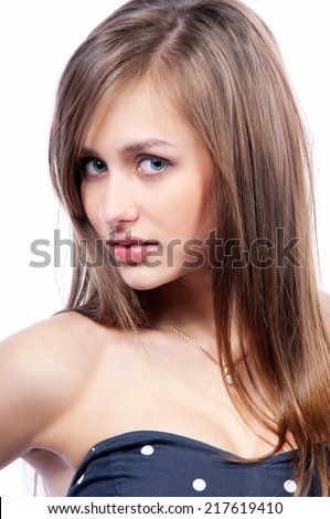 portrait of a cute brunette girl on an isolated background