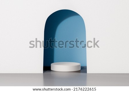 White realistic 3d cylinder pedestal podium with pastel blue in semi circle backdrop. Abstract vector rendering geometric platform. Product display presentation. Minimal scene. Royalty-Free Stock Photo #2176222615