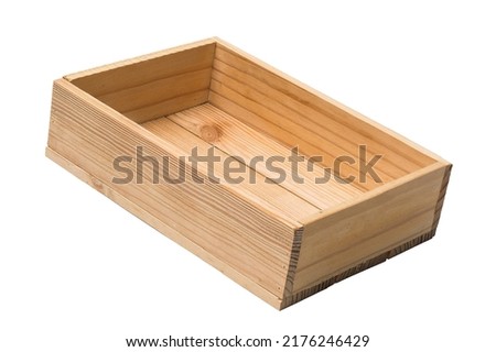 It is the small fruit box on white background. It is a isolated view of an empty new wooden box. 