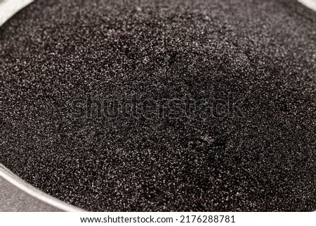 Gunpowder, explosive substances, which burn quickly, used as a propellant charge in firearms, or explosive agents in mining or clearing activities, or fireworks. Royalty-Free Stock Photo #2176288781