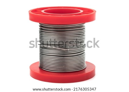 solder for a soldering iron isolated on a white background, a place for your text, copy space Royalty-Free Stock Photo #2176305347