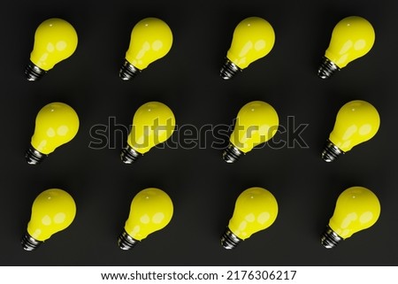 Top view of a bunch of yellow light bulbs over a dark background. The concept of the formation of ideas, creativity, problem solving. 3d render, 3d illustration
