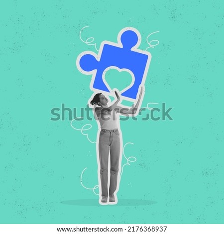 Heart. Bright collage with tall slim girl raising up big drawn piece of puzzle isolated over blue background. Concept of self-knowledge, love, hope concept. Contemporary artwork. Magazine style