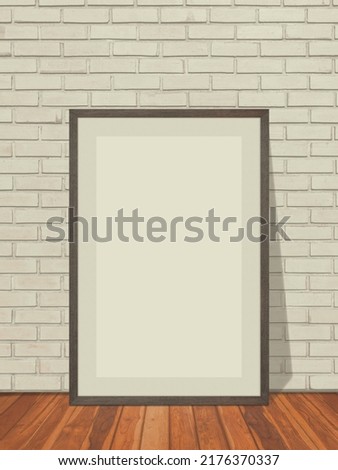 Black blank frame in white brick wall with wooden floor texture interior room background, Mockup template for your content or design.