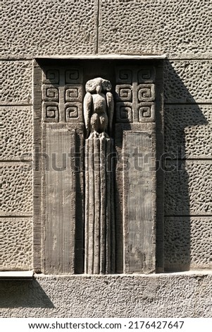 Architectural detail of building. Stone owl.