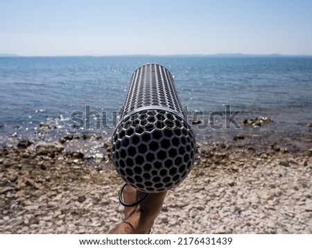 Sea sound recording with boom in hand
