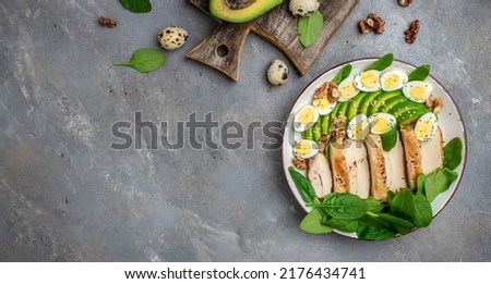 keto diet salad avocado, grilled chicken fillet, quail egg, spinach, walnut. Healthy fats, clean eating for weight loss, banner, menu, recipe place for text, top view,