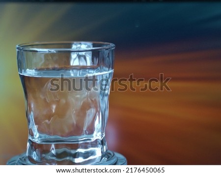 Water in a glass glass, isolated, close-up. High quality photo
