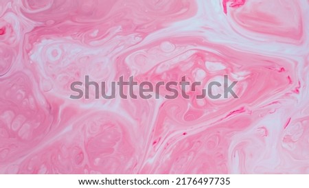 Fluid Art pink background. Abstract backdrop with swirling paint effect. Ink design template mixed texture background