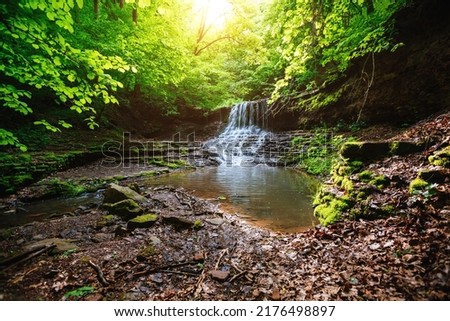 Gorgeous view of the unique waterfall on a sunny day. Location place Rusyliv Falls, Carpathian, Ukraine, Europe. Vibrant photo wallpaper. Picturesque nature photography. Discover the beauty of earth.