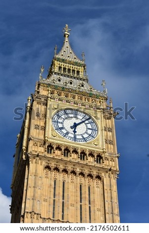 the clock face of Bigben after restoration on the bluesky and bright sunlight.the british cutural icon