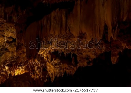a geological formation by mineral deposits in natural caves in italy Royalty-Free Stock Photo #2176517739