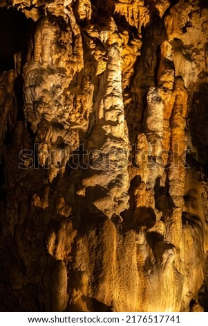 a geological formation by mineral deposits in natural caves in italy Royalty-Free Stock Photo #2176517741