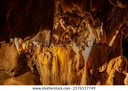 a geological formation by mineral deposits in natural caves in italy Royalty-Free Stock Photo #2176517749
