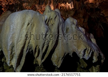 a geological formation by mineral deposits in natural caves in italy Royalty-Free Stock Photo #2176517751
