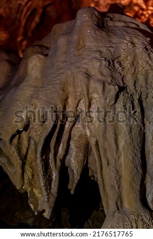 a geological formation by mineral deposits in natural caves in italy Royalty-Free Stock Photo #2176517765
