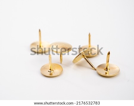 Set of golden thumbtacks. Golden buttons. Royalty-Free Stock Photo #2176532783