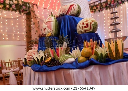 FRUITS ARRANGED IN A BEAUTIFUL WAY AT A WEDDING RECEPTION