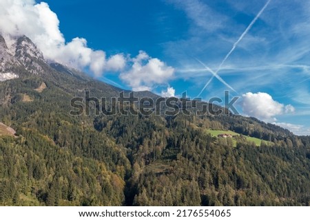Aerial panoramic view of Krimmler Waterfalls (Krimmler Wasserfalle) and the surroundings forest in Krimml, Austria. The Krimml Waterfalls (total height of 380 metres) the highest waterfall in Europe