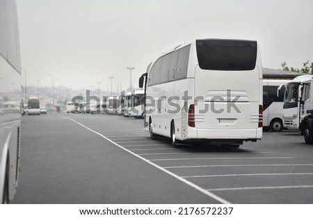 luxury intercity bus is departure from bus station Royalty-Free Stock Photo #2176572237