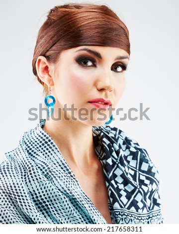 Fashion style young woman posing on isolated white background. Beautiful girl portrait. Female model poses.