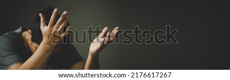 Banner image of Hands folded in prayer on a Holy Bible in church concept for faith, spirituality and religion, woman praying on holy bible.