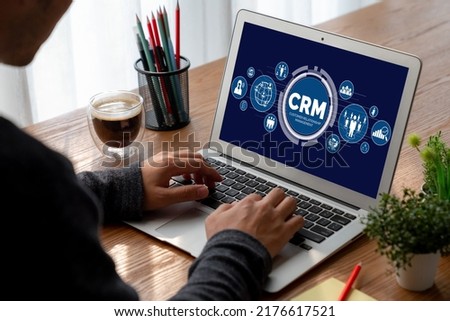Customer relationship management system on modish computer for CRM business and enterprise Royalty-Free Stock Photo #2176617521