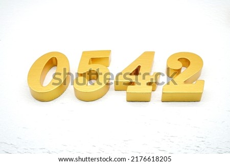  Number 0542 is made of gold painted teak, 1 cm thick, laid on a white painted aerated brick floor, visualized in 3D.                                             