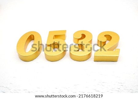    Number 0532 is made of gold painted teak, 1 cm thick, laid on a white painted aerated brick floor, visualized in 3D.                                    