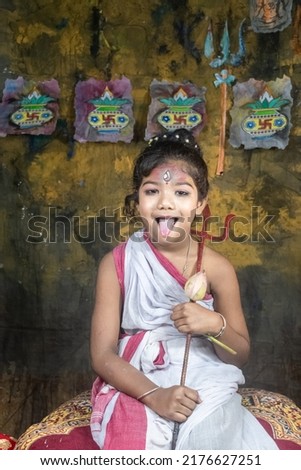 Portrait of a beautiful Indian beautiful teen girl in traditional clothing and accessories 