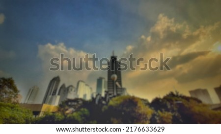 Defocused abstract background of panoramic sunset over skyscrapers. The patterns and colors are so beautiful