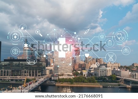Aerial panorama city view of Philadelphia financial downtown at day time, Pennsylvania, USA. Hologram healthcare digital medicine icons. The concept of treatment from disease, Threat of pandemic