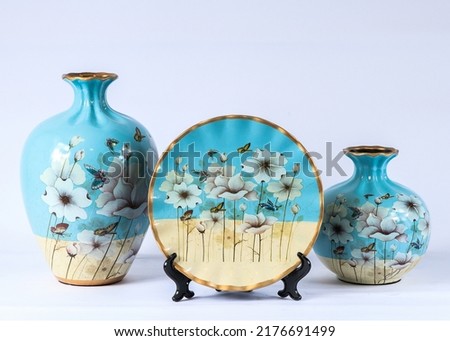 Pottery and porcelain vases set
  Ornate and colorful