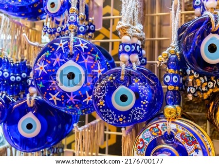 Traditional Turkish amulet Evil Eye or blue eye (Nazar boncugu). Souvenir of Turkey and traditional turkish amulet Royalty-Free Stock Photo #2176700177