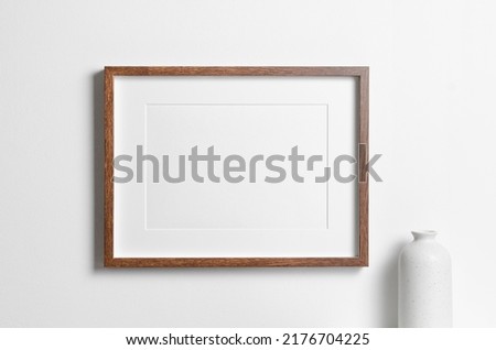Landscape wooden frame mockup with copy space for artwork, photo, painting or print presentation.