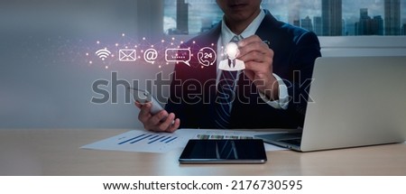 A businessman represents an operator's symbol, which contains after-sales service imagery. Communication channel for customer satisfaction, wifi, message, phone, and web.