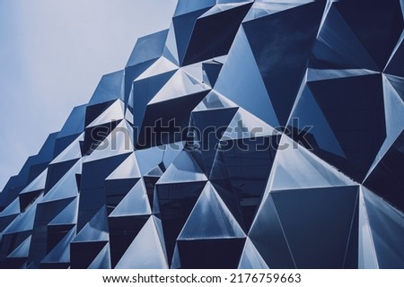 Abstract geometric background with triangles and buildings cells Royalty-Free Stock Photo #2176759663